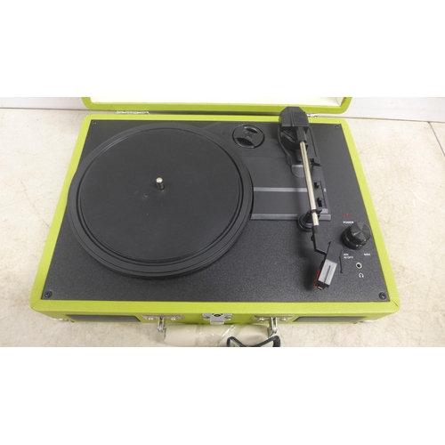 5065 - A Crosley CR8005A-GR green vintage style turntable record player with built in speakers and a chrome... 