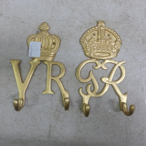 5068 - A pair of cast metal 'VR and GR' Royal seal coat hangers