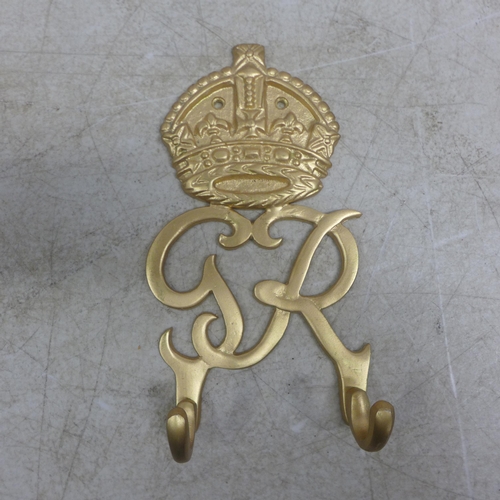 5068 - A pair of cast metal 'VR and GR' Royal seal coat hangers