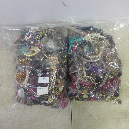 5075 - Two bags of assorted costume jewellery