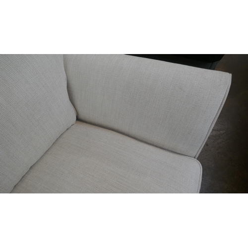 3097 - An ivory weave sofa bed