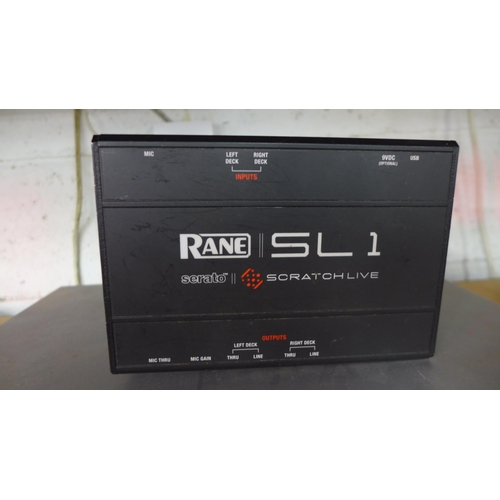 5098 - A Rane Serato SL1 DJ DVS audio interface and a Pure DRX-701 ES digital radio tuner