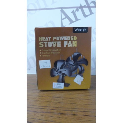 5221 - A fire grate and a Wopigh heat powered stove fan