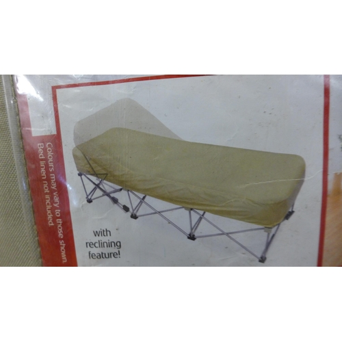 5232 - A folding Ventura 'Anywhere Bed' with reclining feature and storage bag and a pair of Trek Mates Pea... 