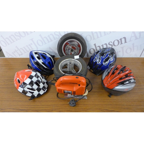 5248 - A Black and Decker KS633E 230v jigsaw, two tubeless wheels and four cycling helmets