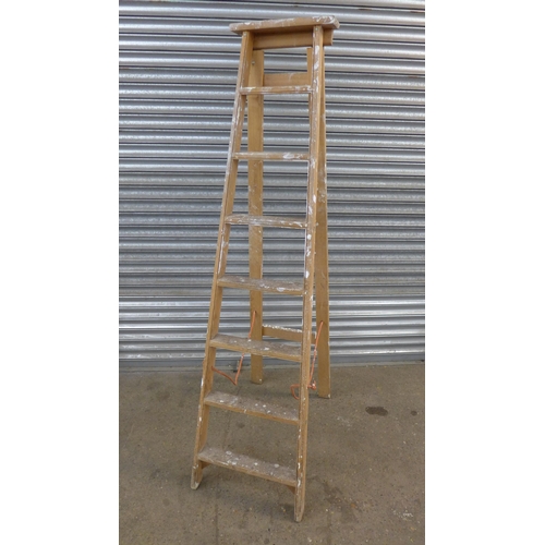 5152 - A set of 4 rung aluminium step-ladders and a set of 8 rung wooden step ladders