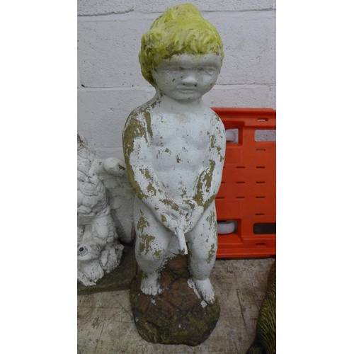 5170 - A collection of assorted concrete garden ornaments including, a badger, an eagle, a cherub, a frog a... 