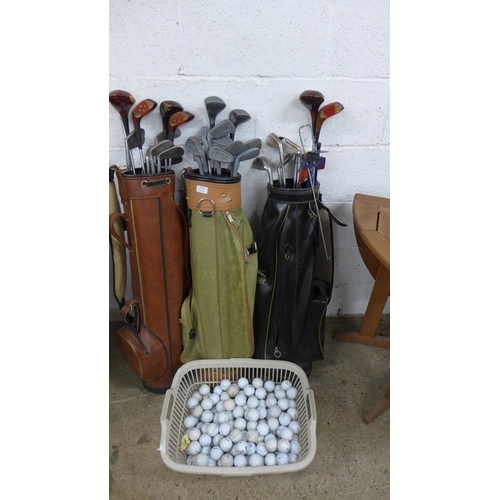 5179 - Three bags of golf clubs including Classic, Strikes and Precision Made clubs, including a large quan... 