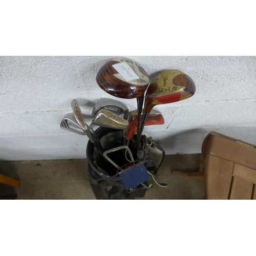 5179 - Three bags of golf clubs including Classic, Strikes and Precision Made clubs, including a large quan... 