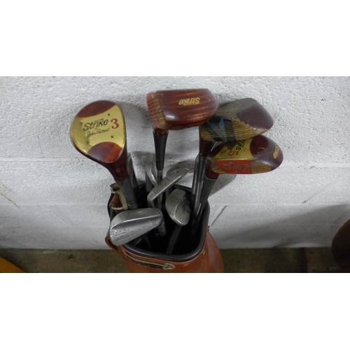 5179 - Three bags of golf clubs including Classic, Strikes and Precision Made clubs, including a large quan... 