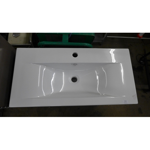 5188 - A grey vanity unit with integrated ceramic handwashing basin