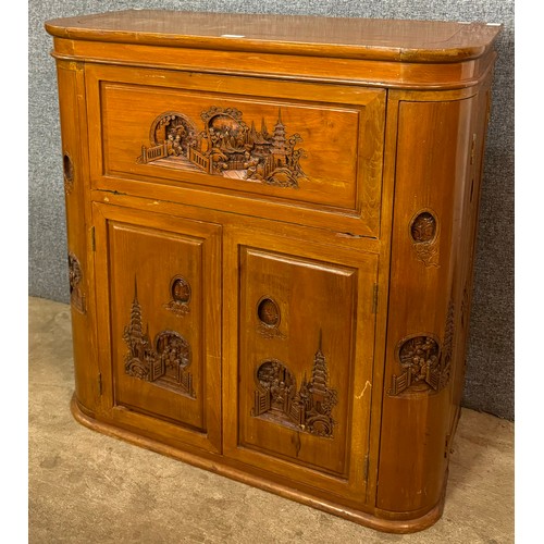 138 - A 19th Century style Oriental carved hardwood cocktail cabinet