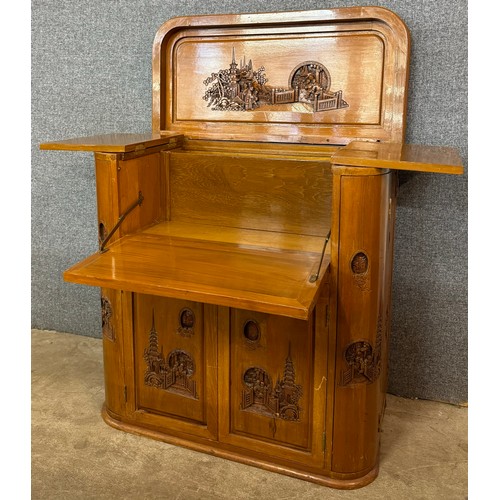 138 - A 19th Century style Oriental carved hardwood cocktail cabinet