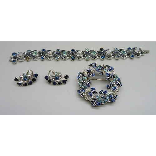 1004 - A Jewelcraft bracelet, together with a pair of similar clip on earrings and a brooch