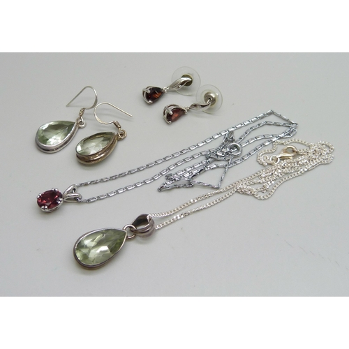 1011 - Two pairs of silver earrings including one pair set with garnets, a plated red stone pendant and cha... 