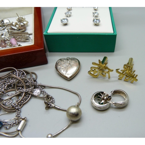 1012 - A collection of silver jewellery including a pair of gilt cufflinks, earrings, bracelets, and a set ... 