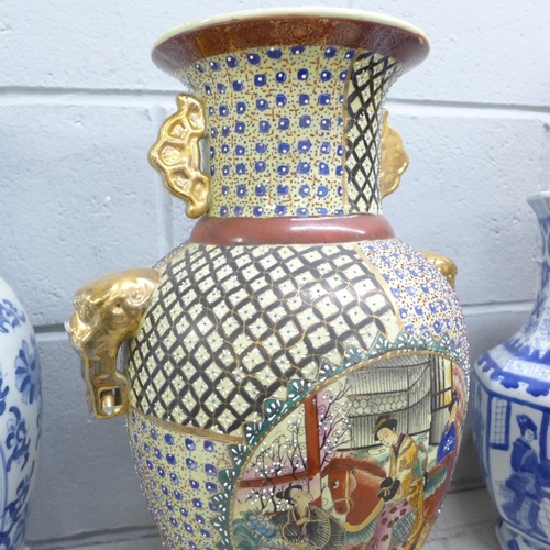 1041 - A collection of five large Oriental vases and  blue and white vase and cover **PLEASE NOTE THIS LOT ... 