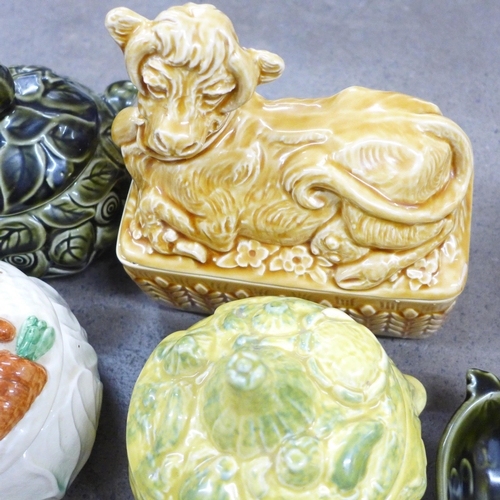 1053 - A collection of eleven Sylvac face pots and a Sadler cow butter dish **PLEASE NOTE THIS LOT IS NOT E... 