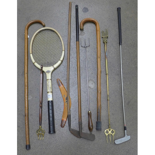 1062 - A collection of walking sticks, a Gunn and Moore tennis racket, etc. **PLEASE NOTE THIS LOT IS NOT E... 