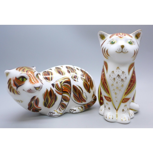 612 - Two Royal Crown Derby paperweights, Majestic Kitten limited edition with gold stopper and New Year T... 