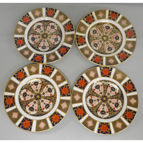 621 - A set of four Royal Crown Derby 1128 pattern tea plates, three seconds, one first quality