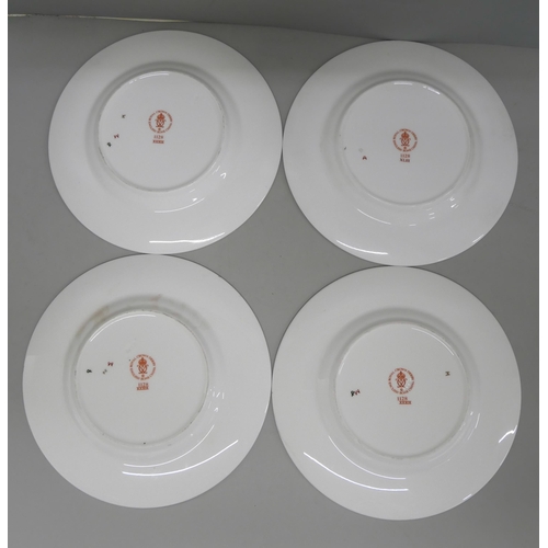 621 - A set of four Royal Crown Derby 1128 pattern tea plates, three seconds, one first quality