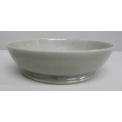 624 - A Chinese celadon dish, crazed, 14.5cm