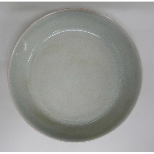 624 - A Chinese celadon dish, crazed, 14.5cm