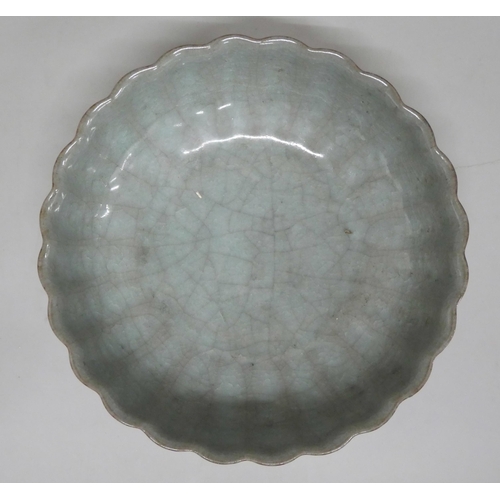 625 - A Chinese celadon wavy edge bowl, 15.5cm