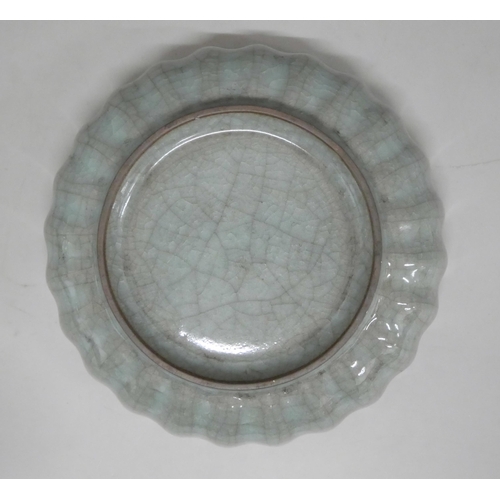 625 - A Chinese celadon wavy edge bowl, 15.5cm