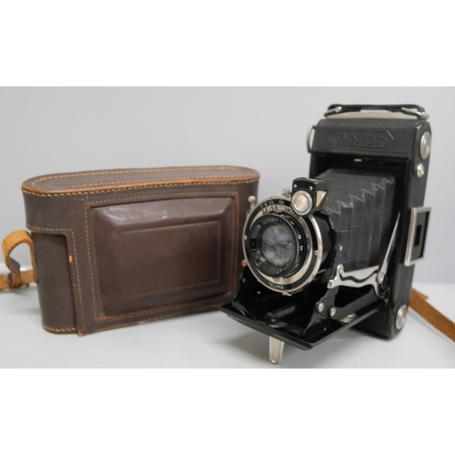 630 - A Nettar folding camera with Zeiss Ikon lens with leather case