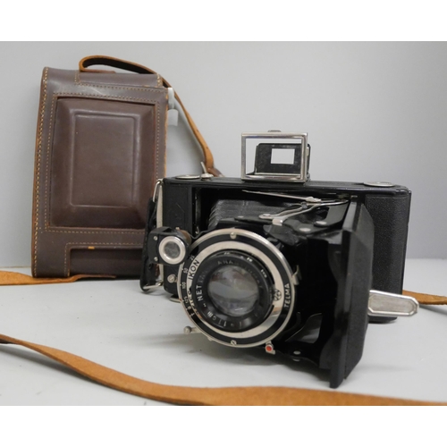 630 - A Nettar folding camera with Zeiss Ikon lens with leather case