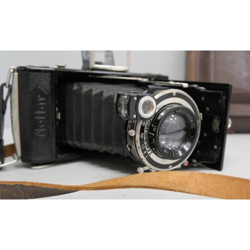 630 - A Nettar folding camera with Zeiss Ikon lens with leather case