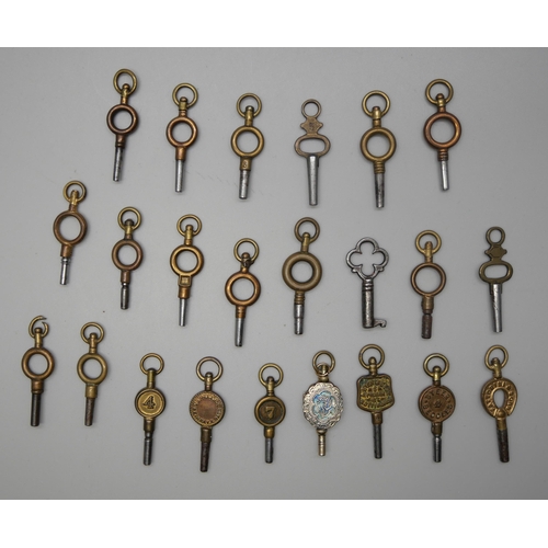 636 - A collection of watch and clock keys including four advertising and an unusual mourning watch key wi... 