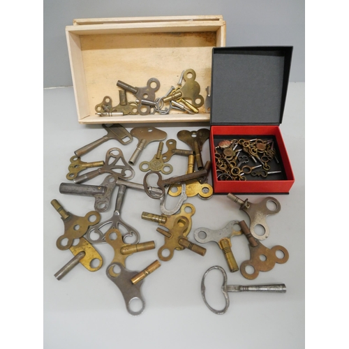 636 - A collection of watch and clock keys including four advertising and an unusual mourning watch key wi... 