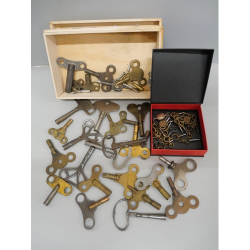 636 - A collection of watch and clock keys including four advertising and an unusual mourning watch key wi... 