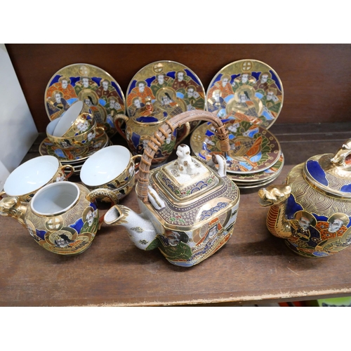 650 - A Japanese hand painted Satsuma tea set, seven side plates, six cups and saucers, tea and coffee pot... 