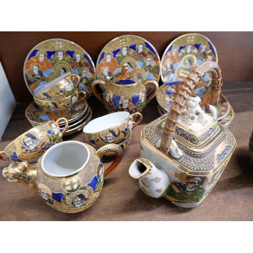 650 - A Japanese hand painted Satsuma tea set, seven side plates, six cups and saucers, tea and coffee pot... 