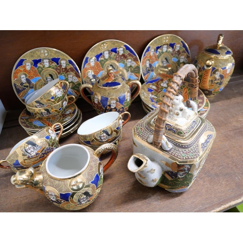 650 - A Japanese hand painted Satsuma tea set, seven side plates, six cups and saucers, tea and coffee pot... 