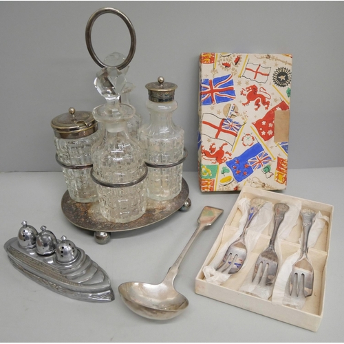 655 - A plated four bottle cruet and other plated items including ocean liner cruet