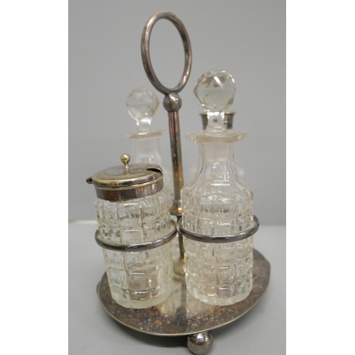 655 - A plated four bottle cruet and other plated items including ocean liner cruet