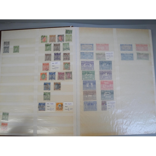 661 - A stockbook containing Iceland collections of mint and used stamps to 1960, the mint catalogues appr... 