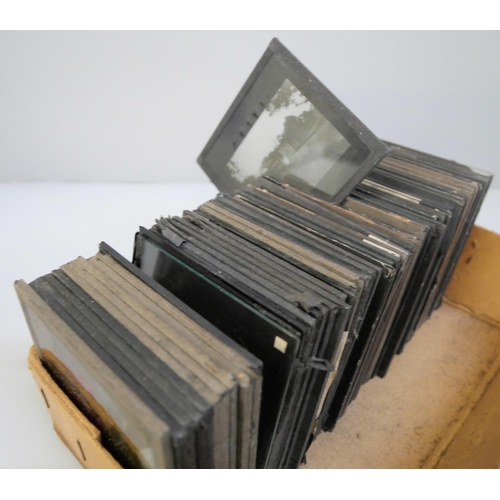 666 - A box of 60 lantern slides