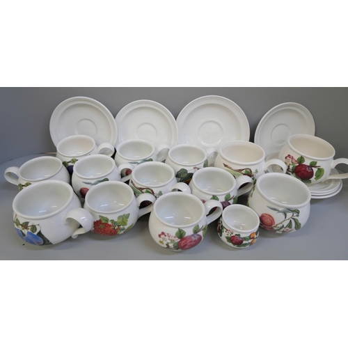 668 - Twelve Portmeirion coffee cups, sugar bowl, seven saucers and egg cup