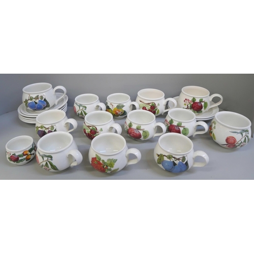 668 - Twelve Portmeirion coffee cups, sugar bowl, seven saucers and egg cup