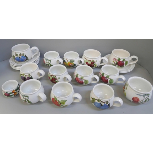 668 - Twelve Portmeirion coffee cups, sugar bowl, seven saucers and egg cup