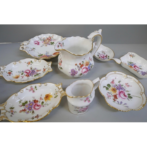 676 - A collection of Royal Crown Derby Derby Posies including bowl, three milk jugs, preserve pot, strain... 