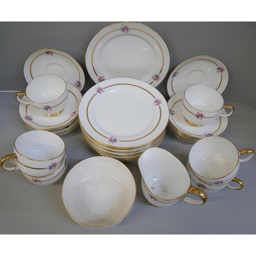 678 - A Paragon ten setting tea set, two cups a/f