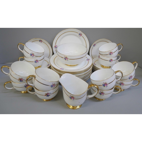 678 - A Paragon ten setting tea set, two cups a/f