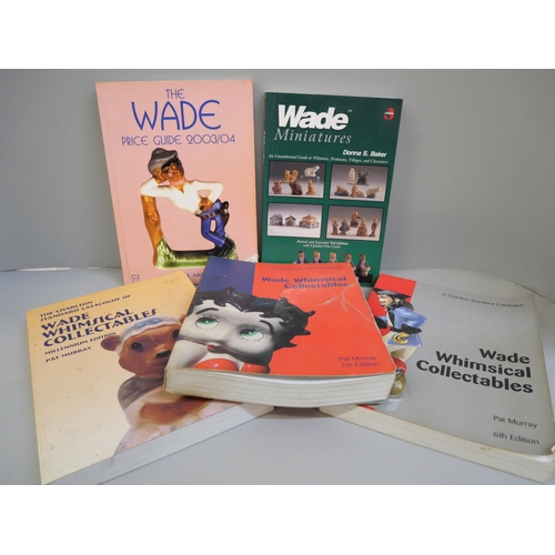 685 - A set of Wade Nat West pigs and five Wade price guides